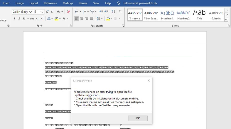 Screenshot of a malicious Word document lure displaying a fake Microsoft Word error dialog box, designed to discourage user scrutiny after macro execution.